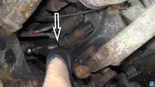 Reasons A Car Won't Start | Bad starter, you may be able to bring it back to working condition, as our mechanic tries to do in this photo.