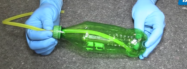 Bleeder bottle with a fuel hose