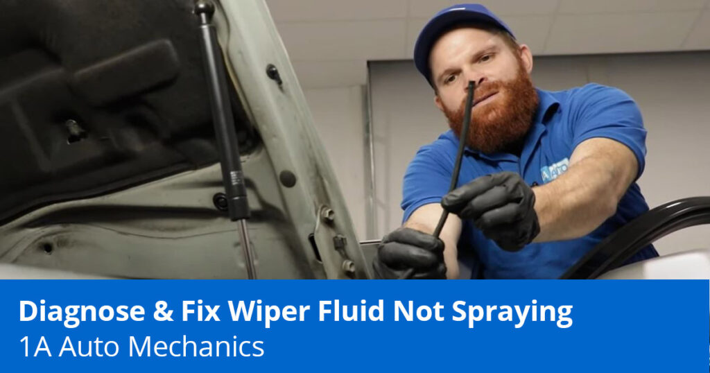 Mechanic showing wiper fluid not spraying