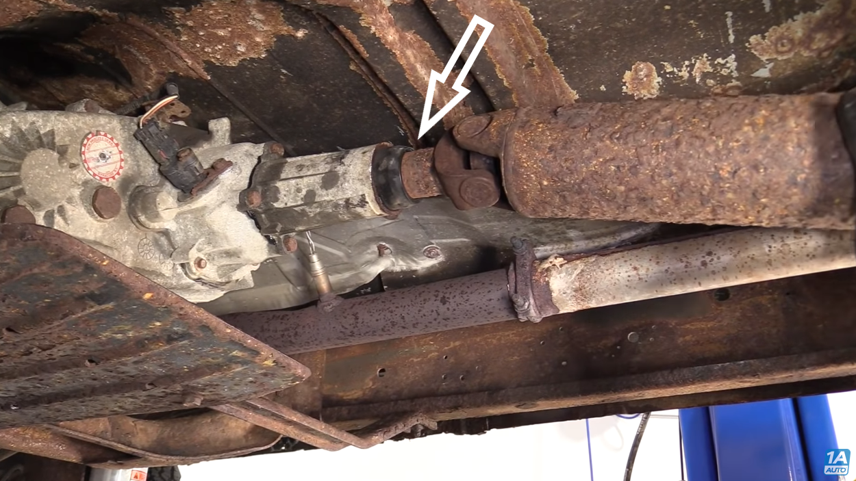 Aligning marks on driveshaft and transfer case before reconnecting