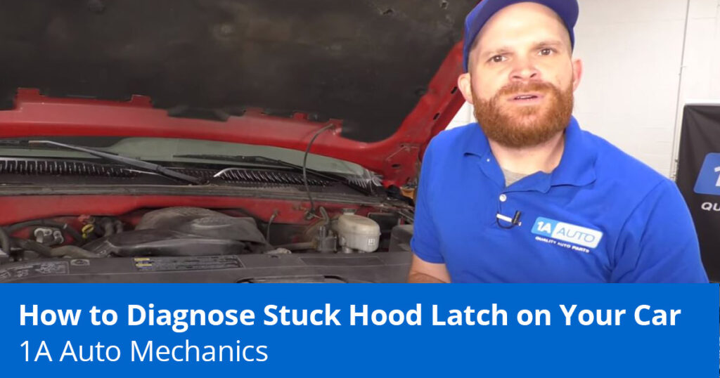 Mechanic showing hood latch stuck