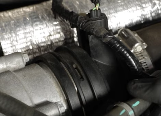 Turbo hose located between the air intake and the turbo on the 2017 to 2020 Ford F-350