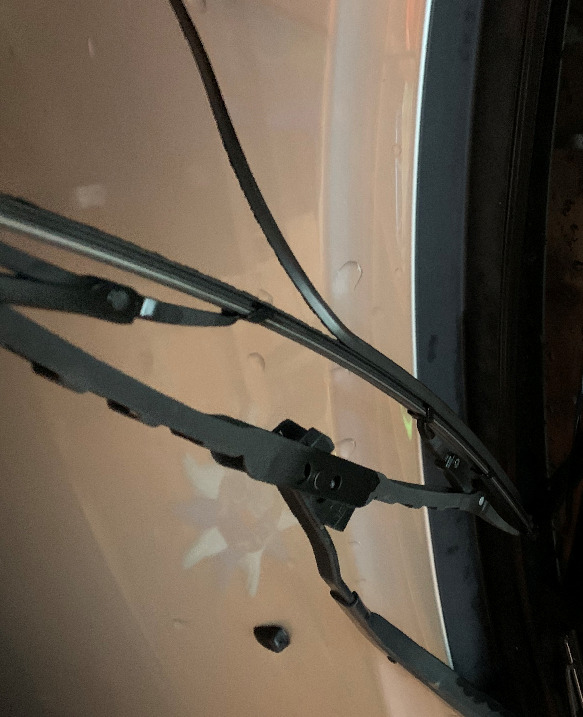 Broken and stripped windshield wiper