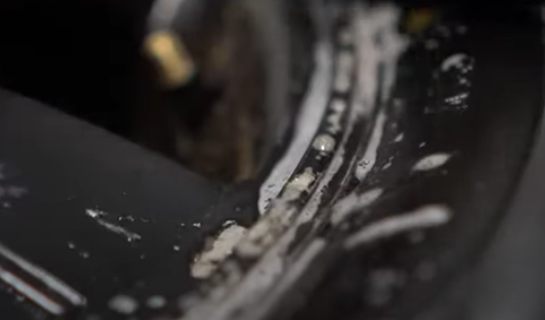 Soapy water on a tire indicating no leak
