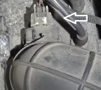 Throttle position sensor switch on the backside of the throttle body