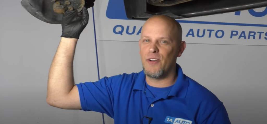 1A Auto expert mechanic Andy explaining how to remove ball joint rivets