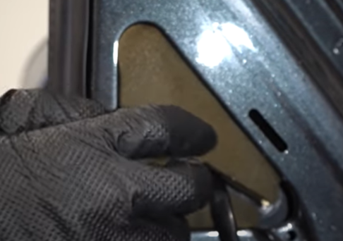 Installing insulation to a side view mirror