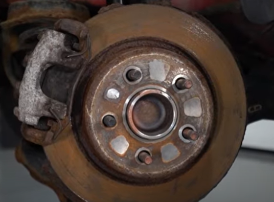 Rusted rotor on a 2005 to 2012 Volvo S40 with rear caliper problems