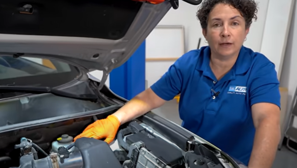 1A Auto mechanic reviewing the correct order to bleed brakes