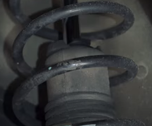 Front coil spring on a 2007 to 2012 Nissan Versa