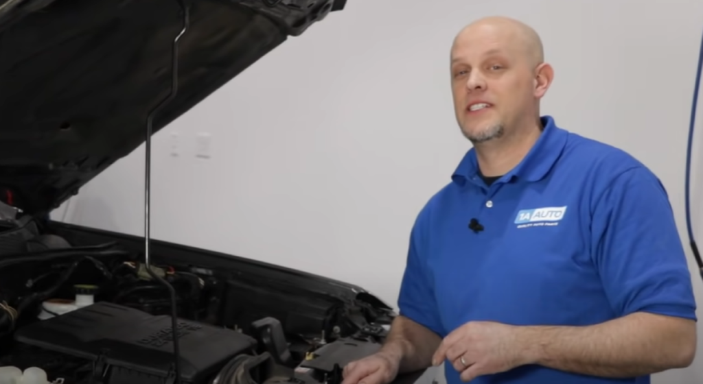 Mechanic reviewing how to change the oil in any vehicle