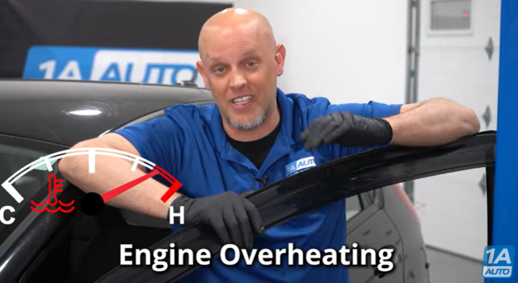 Mechanic reviewing how a blown head gasket can cause an overheating engine and white smoke from the exhaust