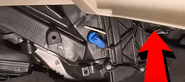 Blower motor resistor location underneath the passenger-side dash on the 2011 to 2019 Ford Fiesta
