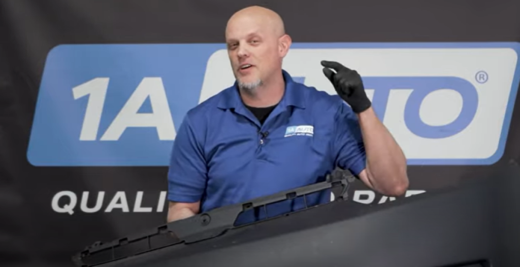 Mechanic reviewing how to fix a damaged or broken bumper