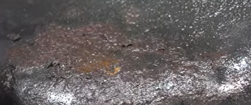 Seeping rot hole on a transmission oil pan