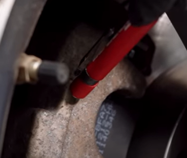 Magnet pressed against an aluminum brake caliper